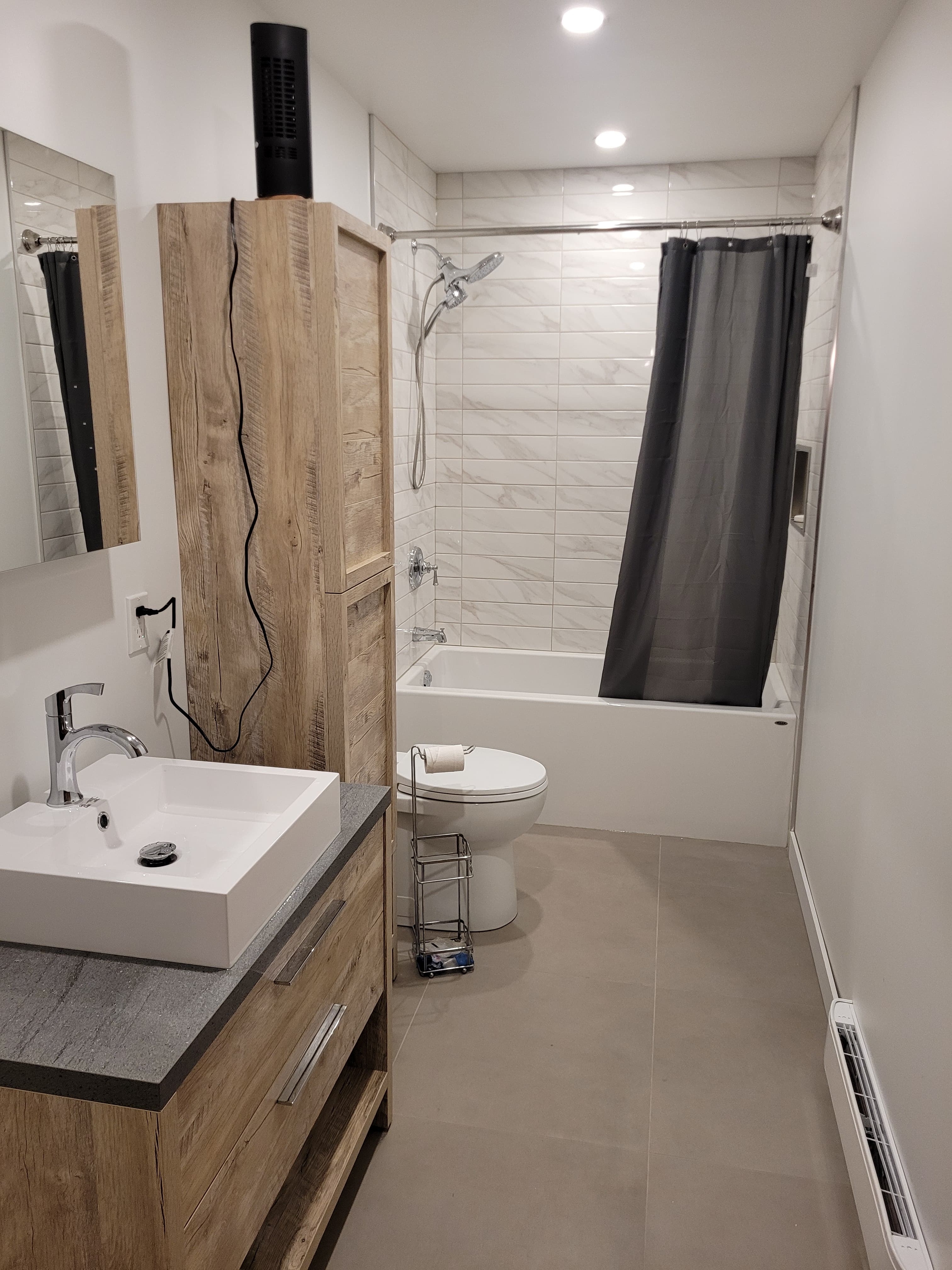 Salle de bain rénovée bois & céramique